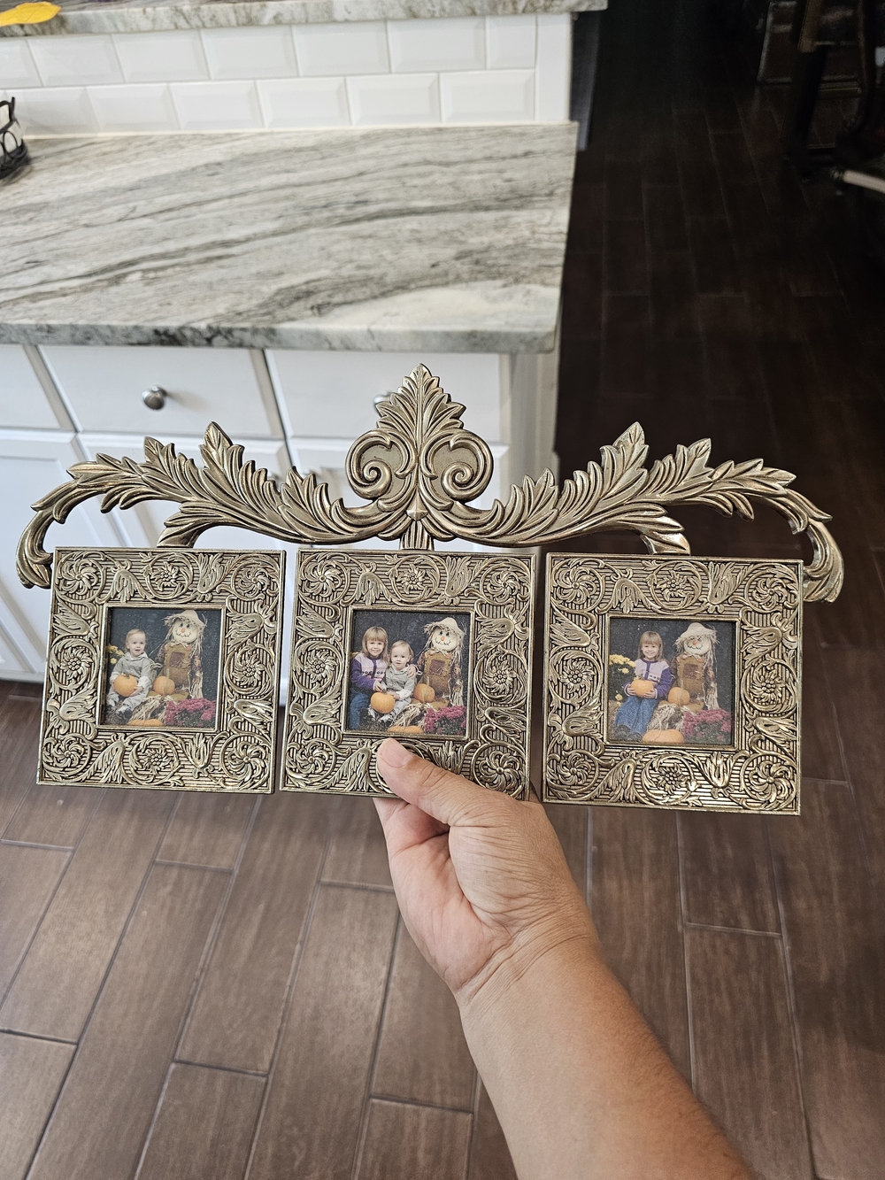 The Bombay Company 1999Ornate Triple Picture Frame in Antique Gold Finish